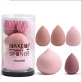 Five pink and brown cosmetic puff makeup sponges displayed in a clear container, designed for versatile makeup application.